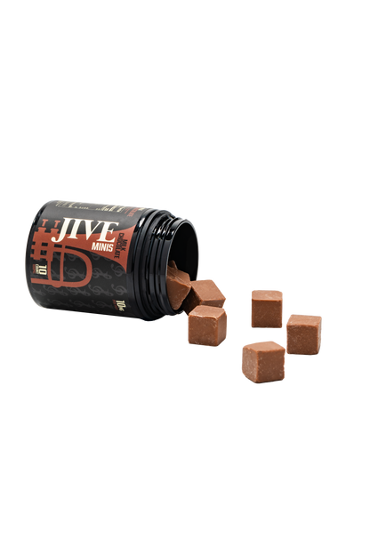 JIVE Milk chocolate minis with chocolates coming out of the jar. Black jar with brown label. 